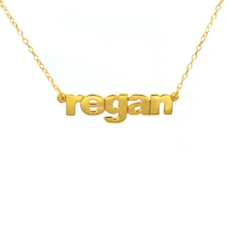 Image of a gold nameplate in the name "Regan"